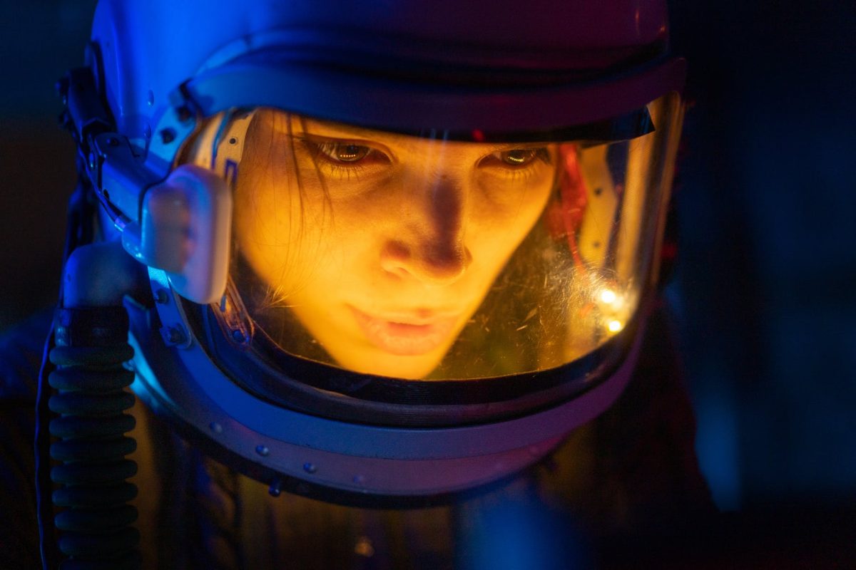 close up photo of woman in a spacesuit